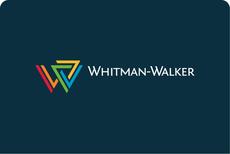 Whitman-Walker logo with multicolored triangular design on a dark blue background and white text reading “Whitman-Walker.”.