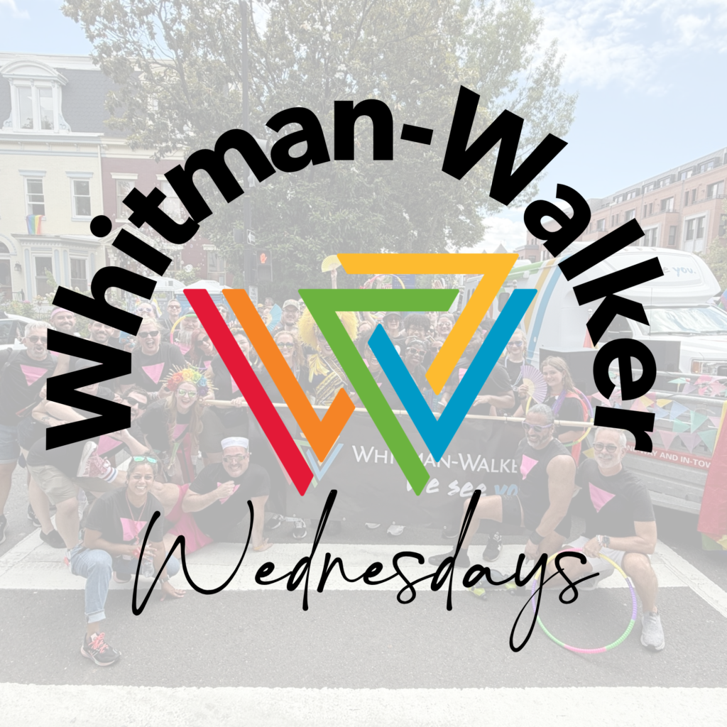 A group of people pose outdoors behind a large Whitman-Walker logo with the text "Whitman-Walker Wednesdays" overlayed, showing how Whitman Walker stand with us in support and community.
