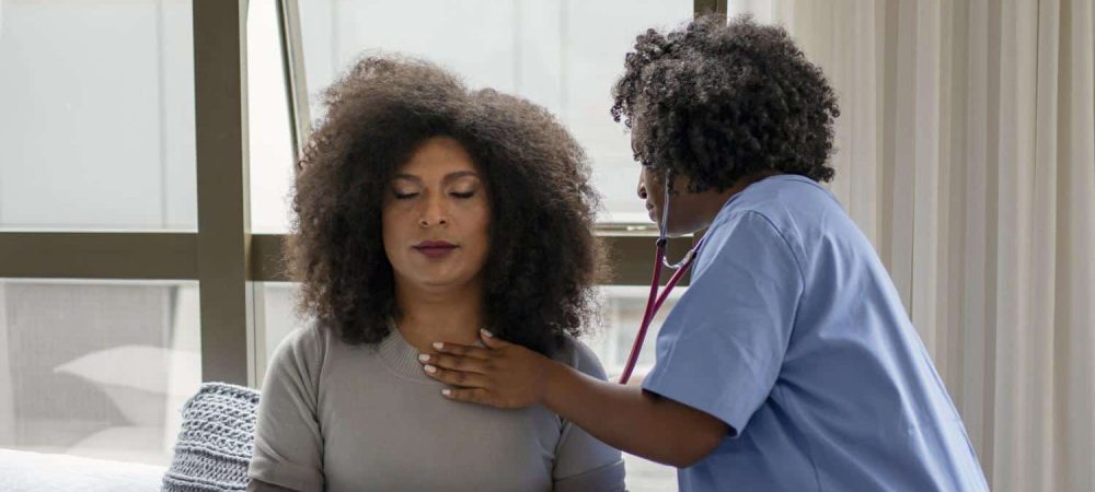 Nurse Examining Patient