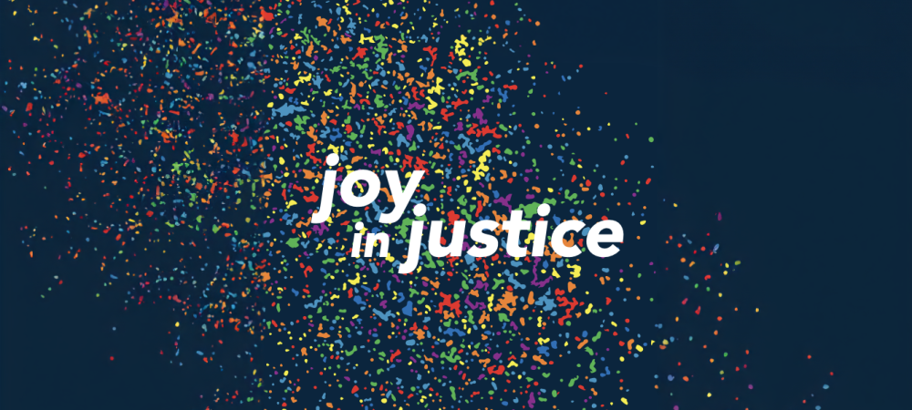 The phrase “joy in justice” appears in white text on a dark blue background, surrounded by an explosion of colorful confetti particles.