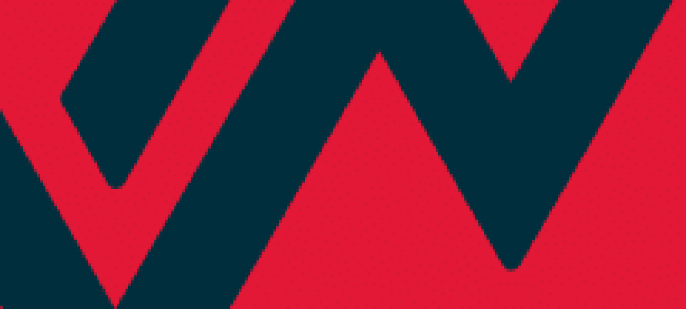 A geometric pattern featuring bold red and dark blue shapes forming interlocking lines and angles.